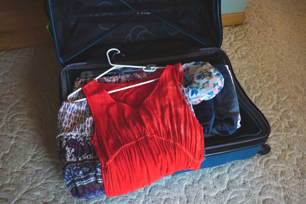 clothing added to suitcase