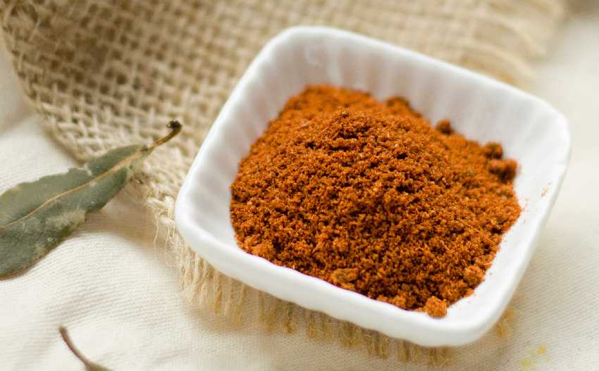 small dish of ground cinnamon