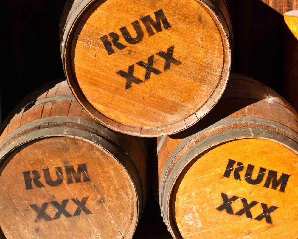 barrels of rum stacked up