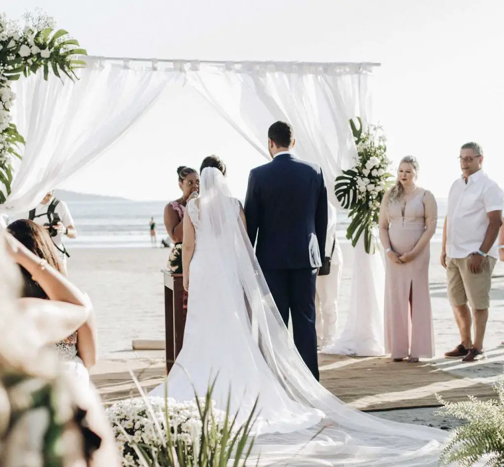 a couple getting married on the beach