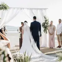 a couple getting married on the beach